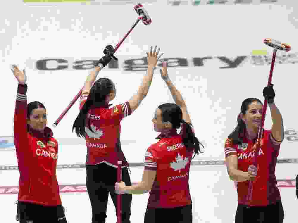 Canada players salute the crowd after defeating Japan