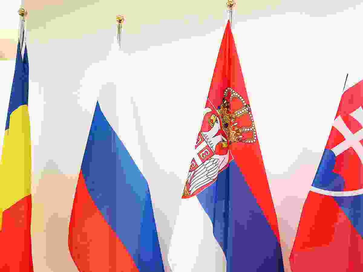Flags of Romania, Russia, Serbia and Slovakia are displayed in the Paralympic Village ahead of the Milano Cortina 2026 Winter Paralympic Games in Cortina d'Ampezzo, Italy, on March 5, 2026.