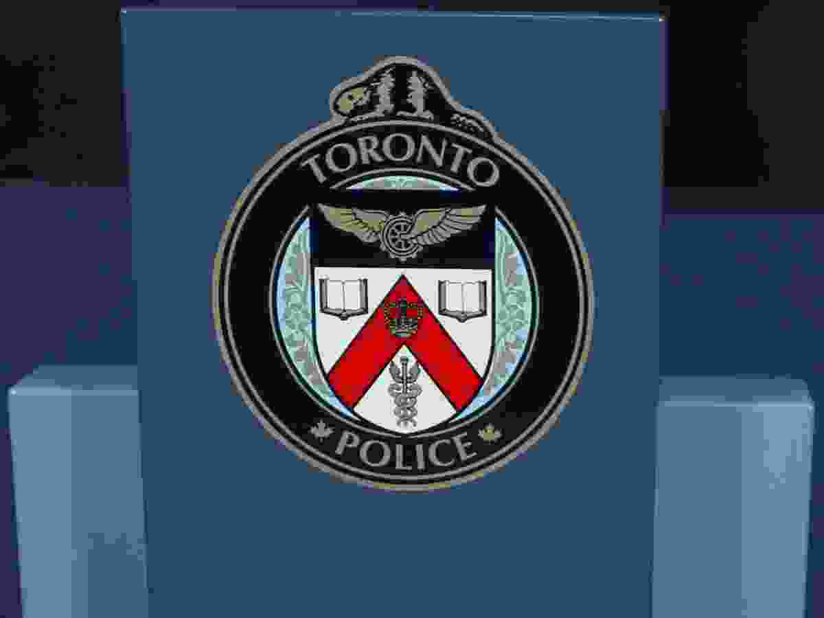 A podium with the Toronto police logo