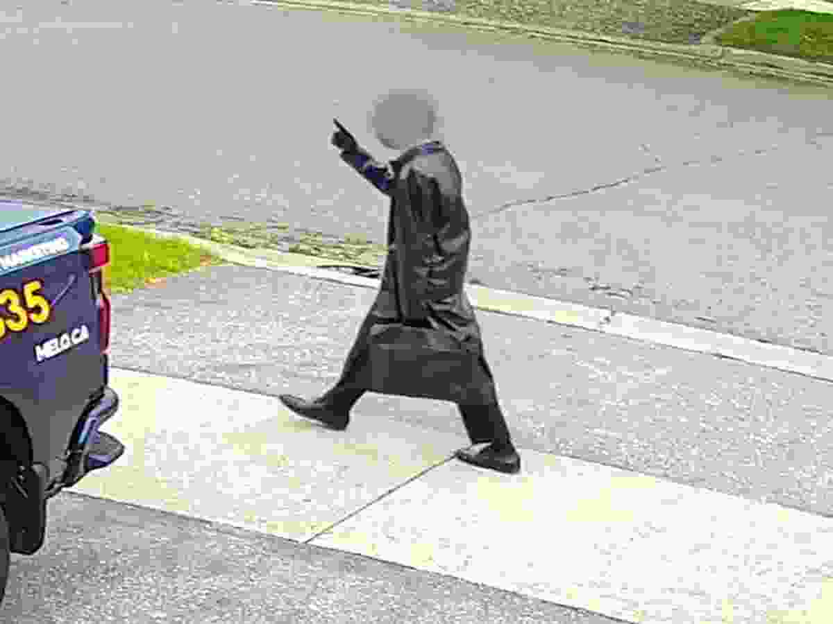 Teen wearing a trench coat.