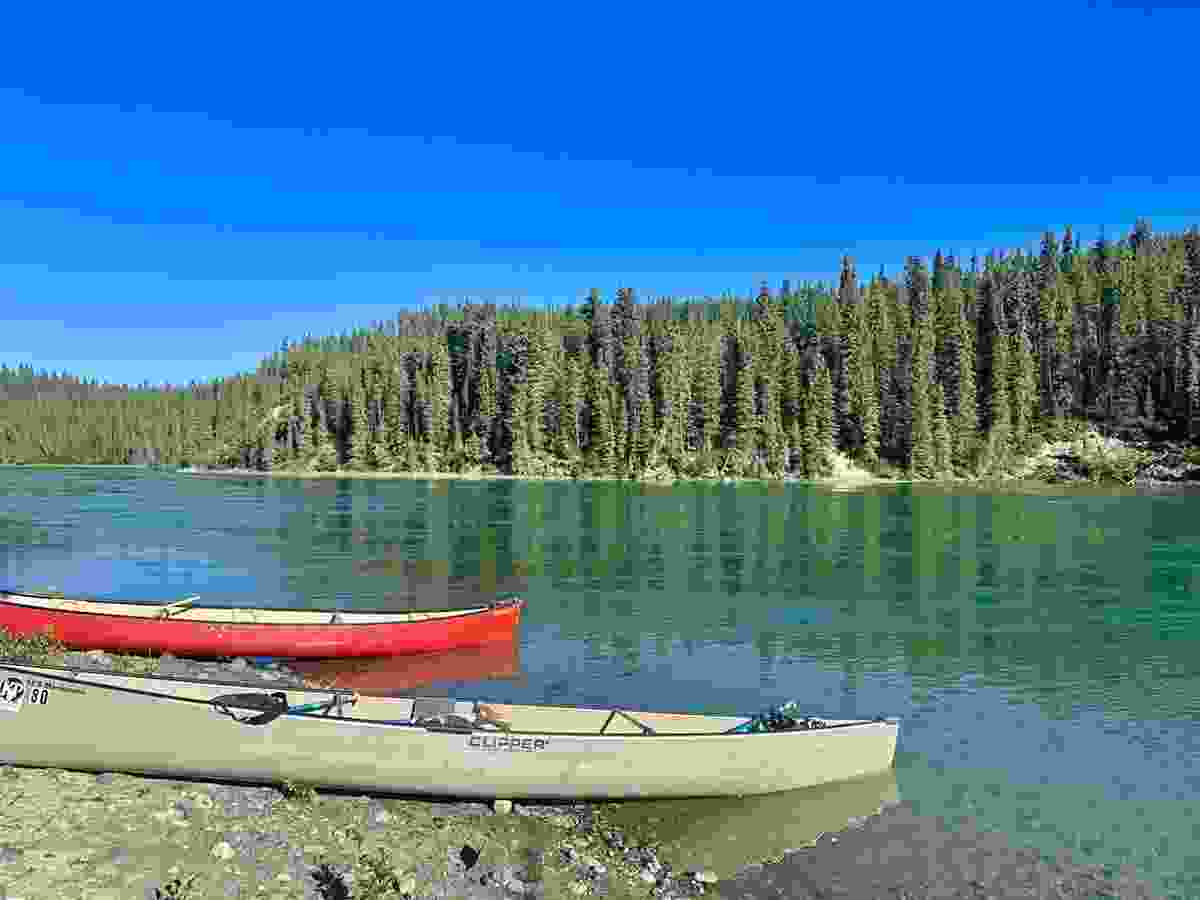 An evening paddle along the Yukon River with Kanoe People looks different under a bright blue sky.