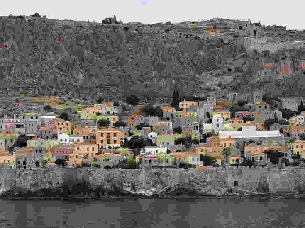 Monemvasia is a medieval fortress town into the side of a massive rock along the Peloponnese coast.