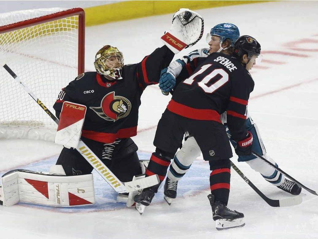 Samuel Ersson gloves down a puck.