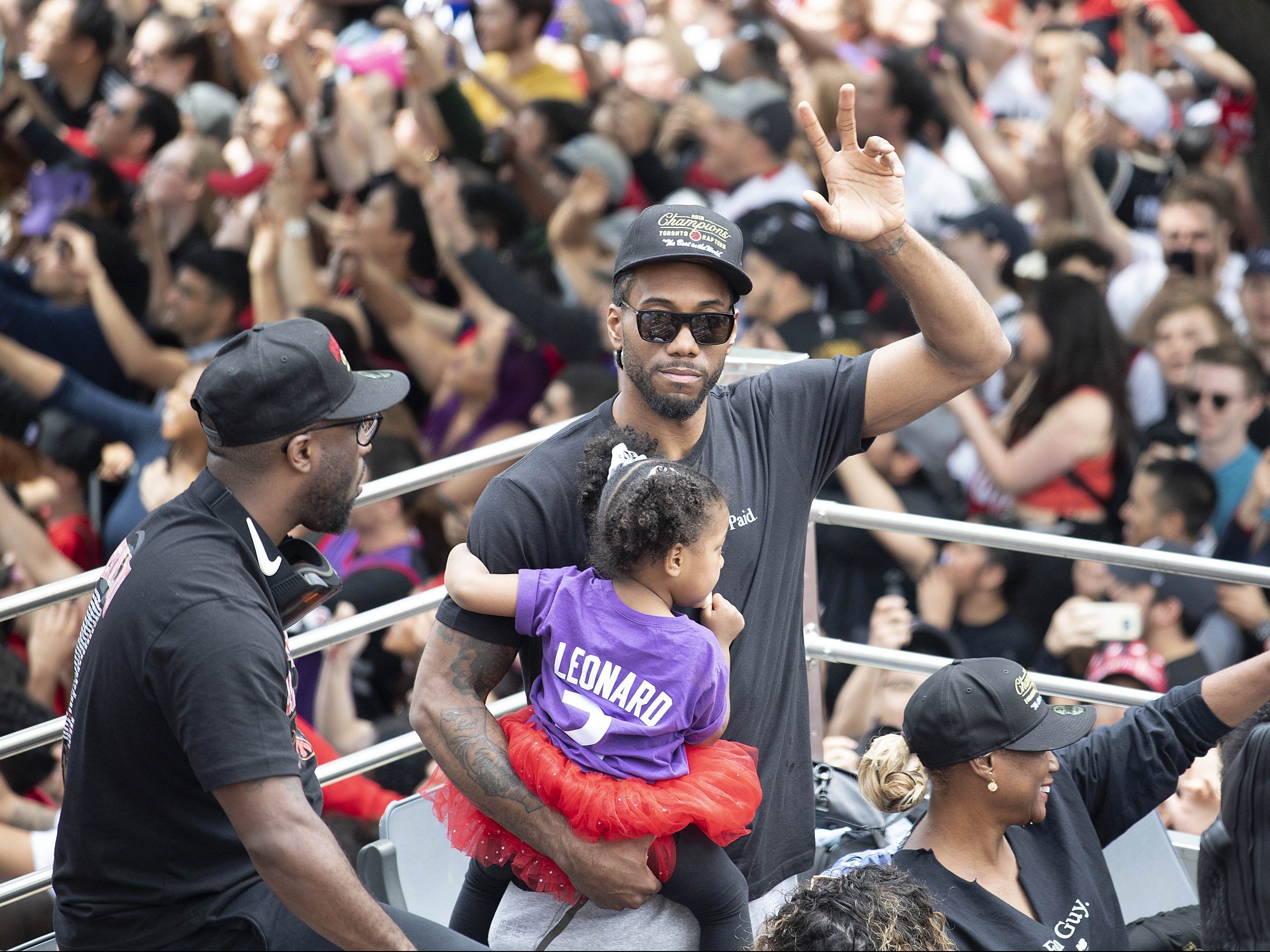 Raptors forward Kawhi Leonard salutes the crowd at the Toronto Raptors Championship Parade.