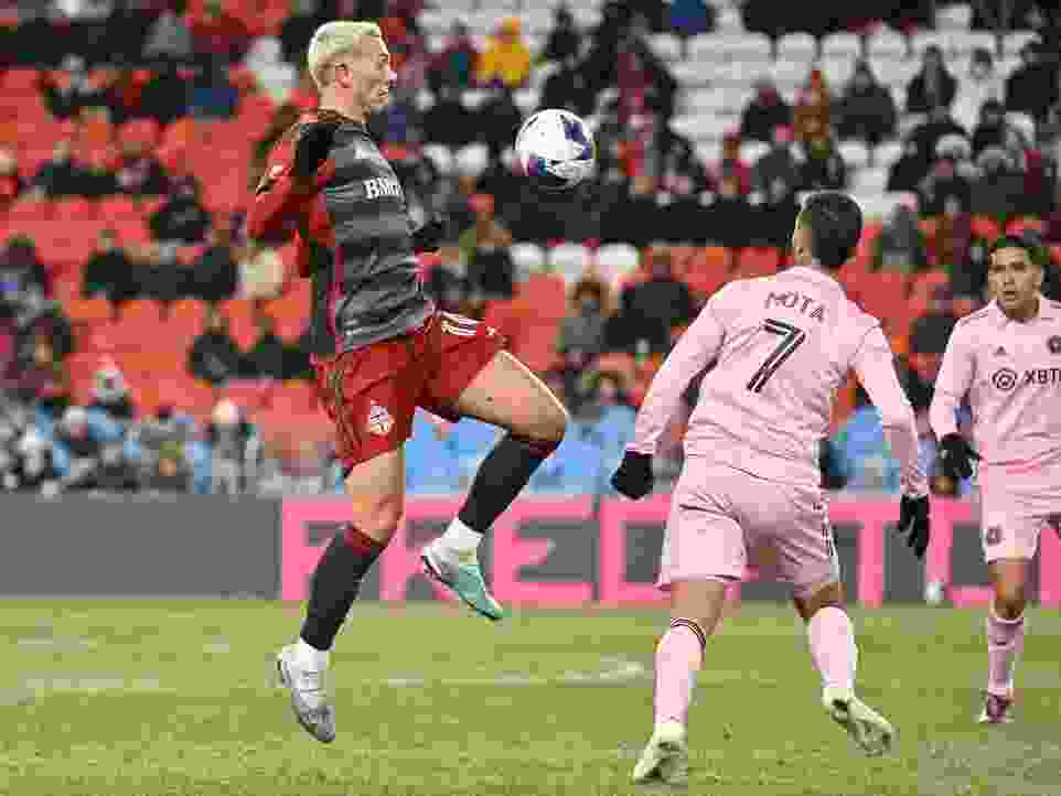 Mar 18, 2023; Toronto, Ontario, CAN; Toronto FC midfielder Federico Bernardeschi (10) battles for the ball with Inter Miami midfielder Jean Mota (7) in the second half at BMO Field.