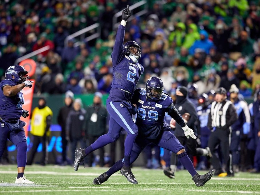 Shawn Oakman #2 and Dewayne Hendrix #99 of the Toronto Argonauts celebrate after a sack in the 109th Grey Cup game between the Toronto Argonauts and Winnipeg Blue Bombers at Mosaic Stadium on November 20, 2022 in Regina, Canada.