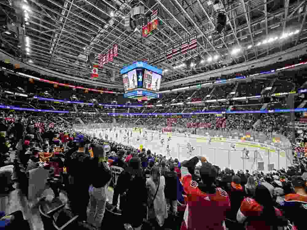 Fans watch the pregame skate