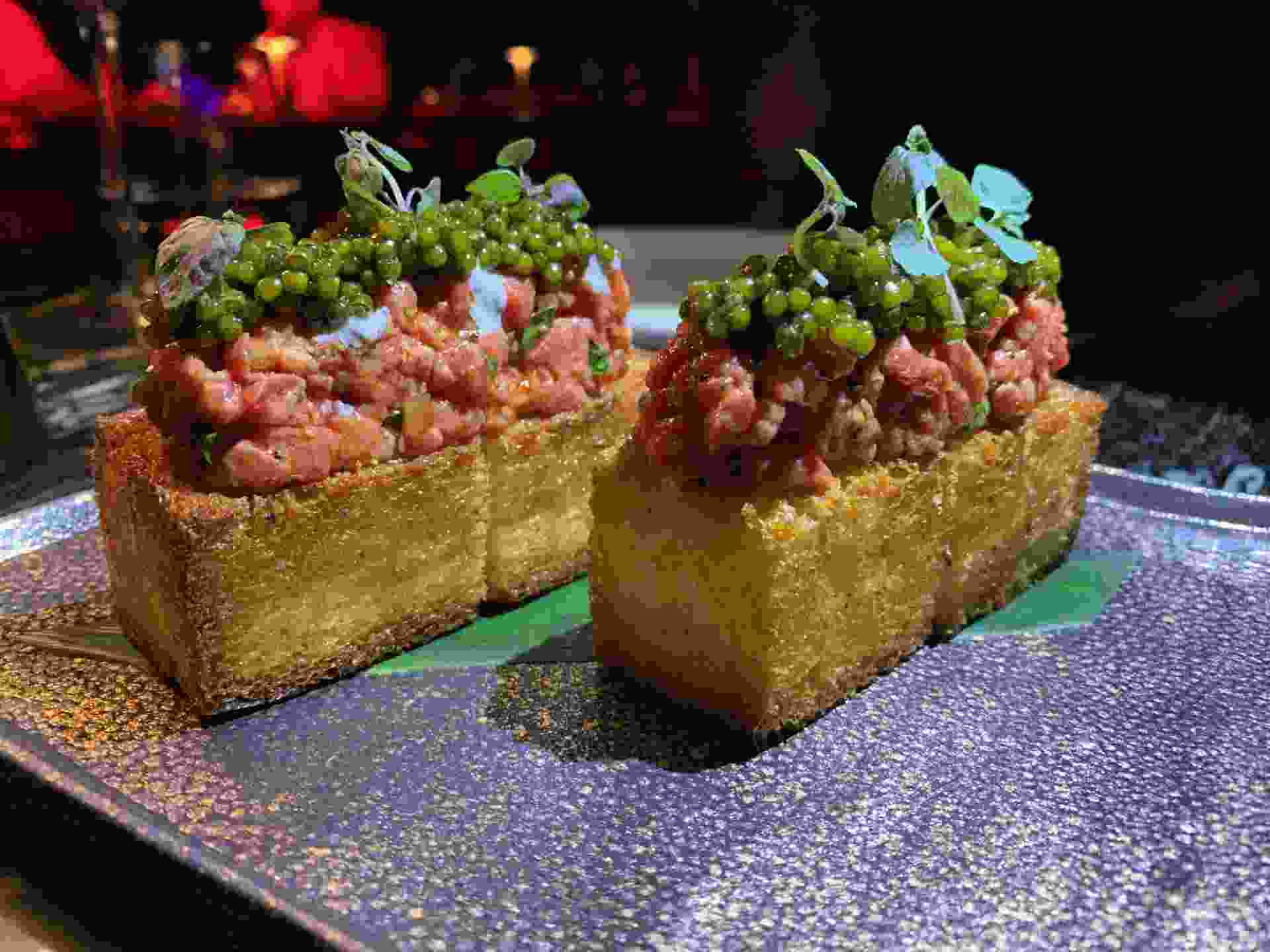 Steak tartare, caviar, truffle aioli, lemon, and toasted brioche at Papi Steak in Las Vegas.