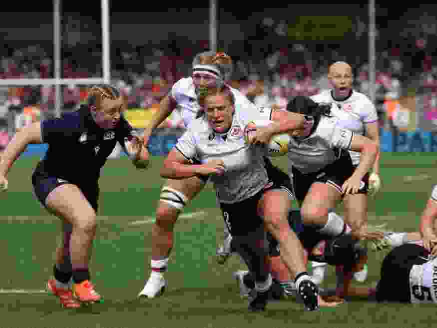 Canada hooker Emily Tuttosi runs in a try during a 40-19 Women's Rugby World Cup Pool B win over Scotland in Exeter.