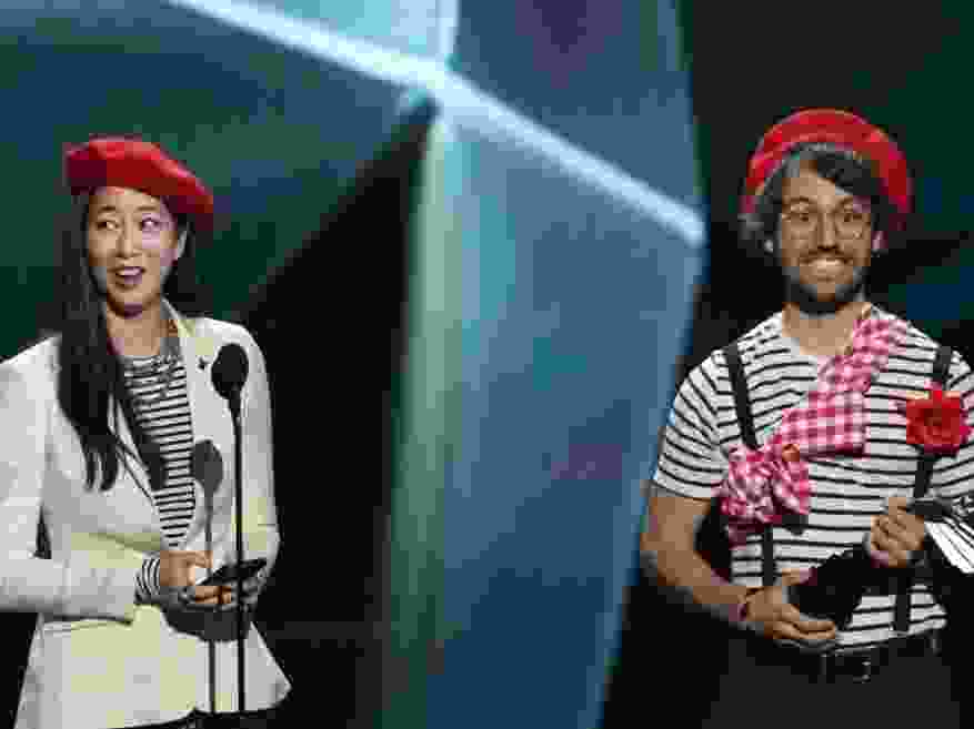Jennifer Svedberg Yen (L) and Guillaume Broche, creators of the video game 'Clair Obscur: Expedition 33' along with the rest of their team attended the Game Awards wearing red berets from a character outfit available to players.