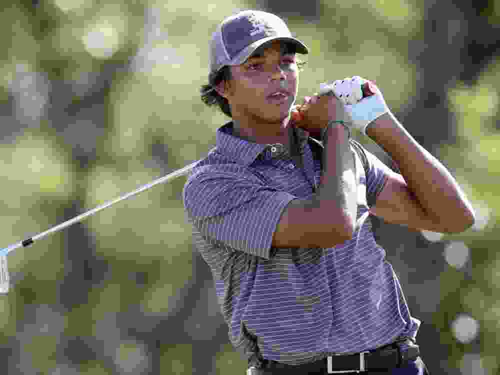 Charlie Woods hits a tee shot on the fourth hole during the first round of the U.S. Junior Amateur on July 21, 2025.