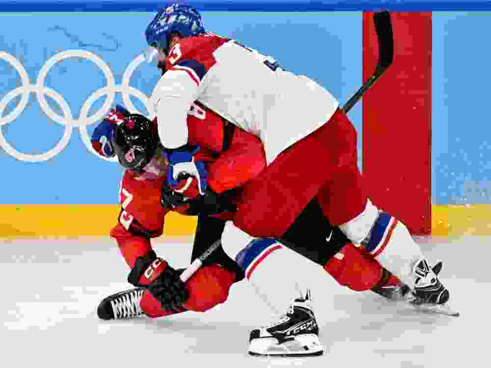 Czech Republic's Radko Gudas checks Canada's Sidney Crosby during the men's quarterfinal at the Milano Cortina 2026 Winter Olympic Games.