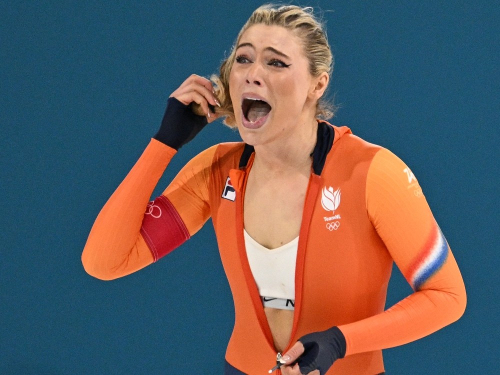 Jutta Leerdam of Team Netherlands celebrates after breaking the Olympic record and winning the gold medal during Speed Skating Women's 1000-metre at the Milano-Cortina 2026 Winter Olympic Games.