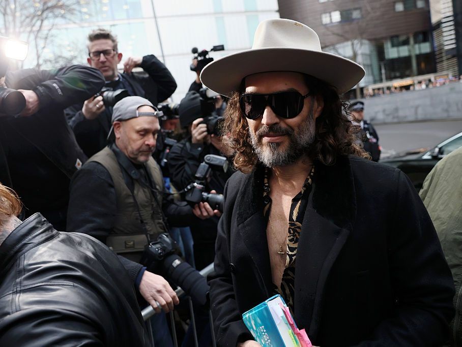 Russell Brand appears for a hearing regarding the two latest charges against him for rape and sexual assault at Southwark Crown Court on February 24, 2026 in London, England. 