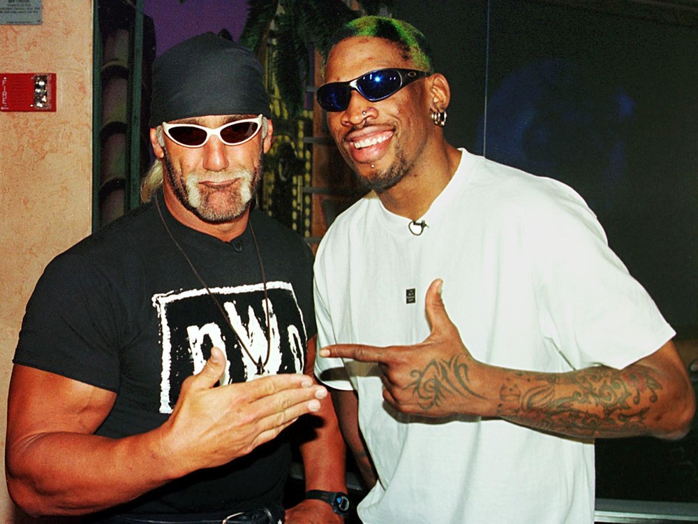 Professional basketball player Dennis Rodman (R) o