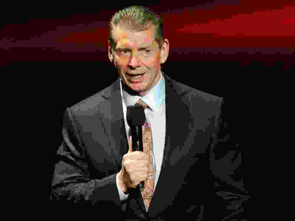 Former WWE chairman and CEO Vince McMahon speaks at a news conference in 2014.