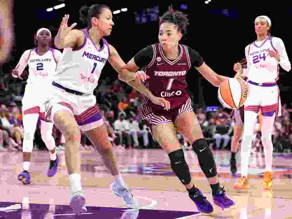 Kiki Rice of the Toronto Tempo dribbles the ball against Noemie Brochant of the Phoenix Mercury.