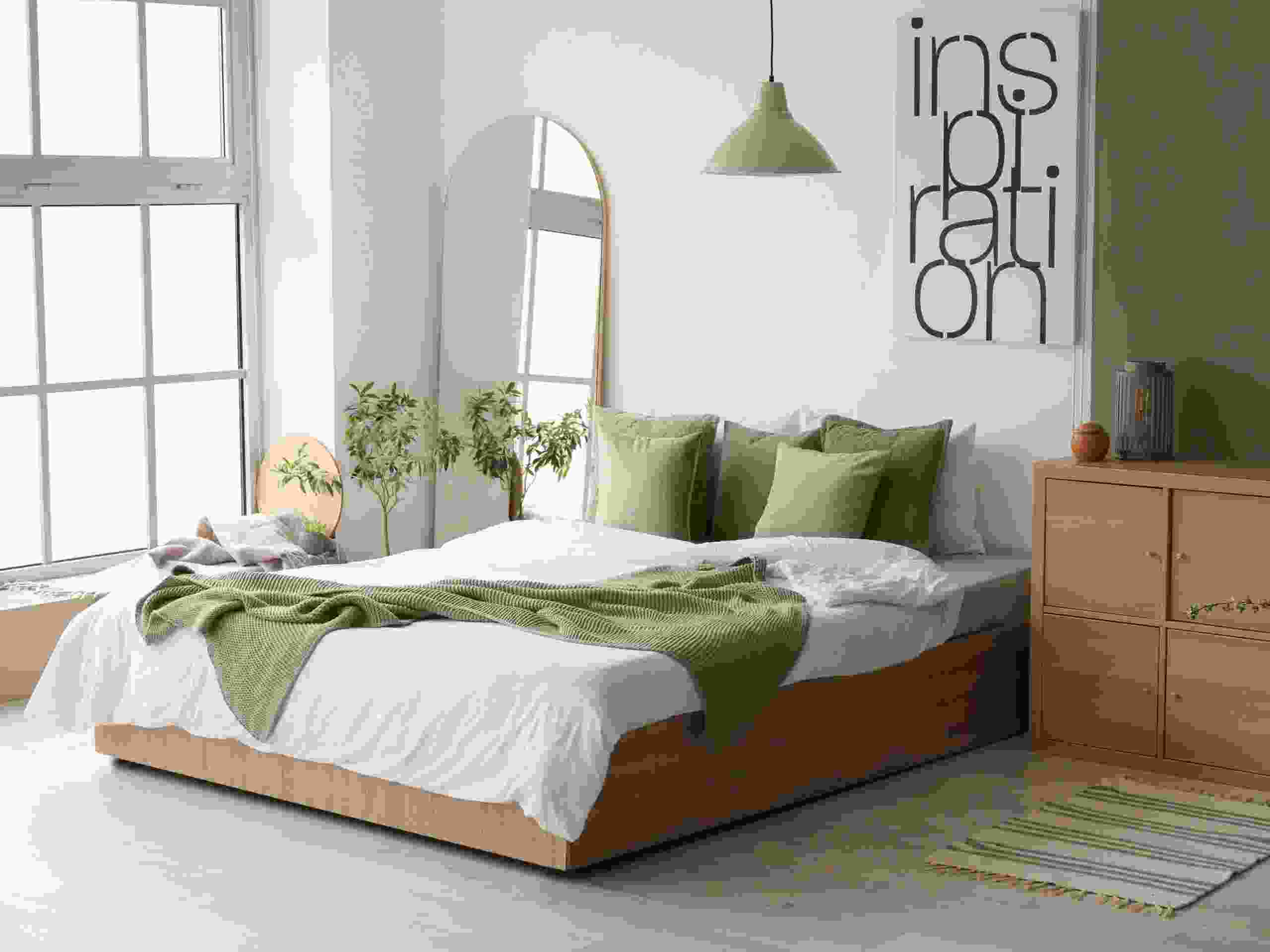 Interior of stylish room with big bed and mirror