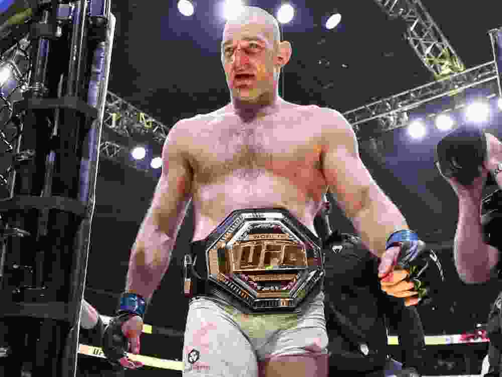 Sean Strickland exits the ring after his victory via split decision over Khamzat Chimaev in a middleweight title bout during UFC 328.