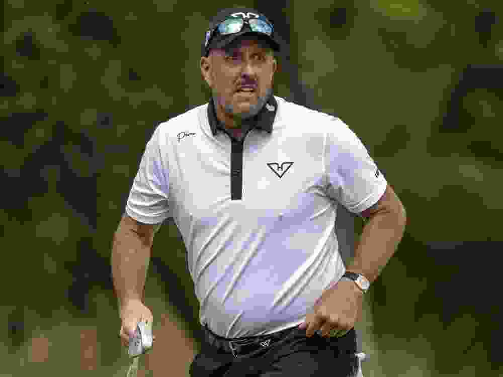 Phil Mickelson plays a bunker shot during LIV Golf South Africa.