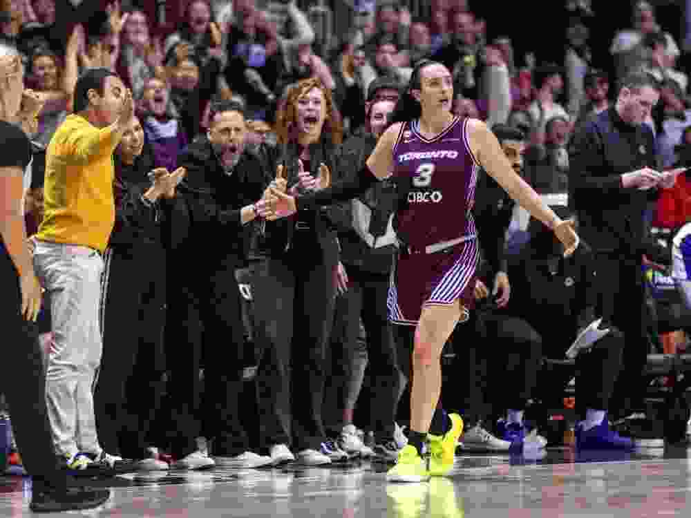 Marina Mabrey celebrates after scoring 53 points