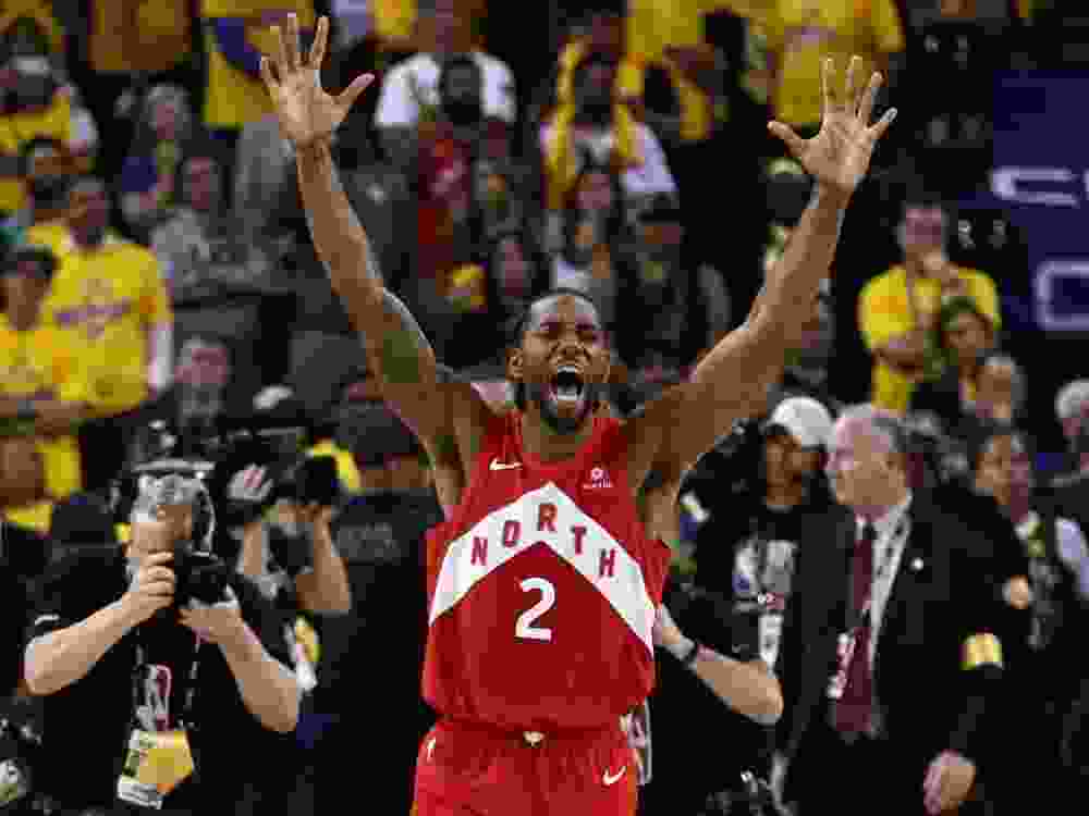 Kawhi Leonard of the Toronto Raptors celebrates his team's win over the Golden State Warriors in Game 6 to win the 2019 NBA Finals.