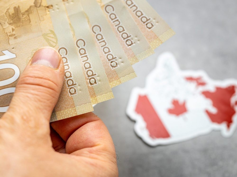 Canadian $100 bills.