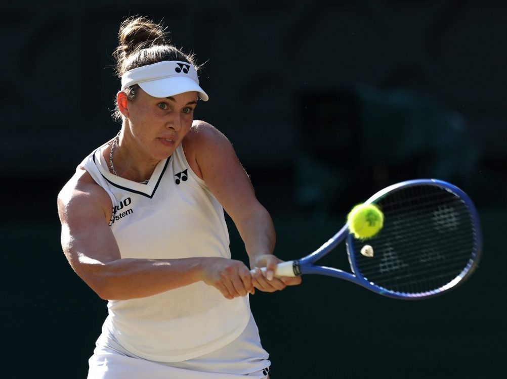 Linda Noskova of Czechia plays a backhand