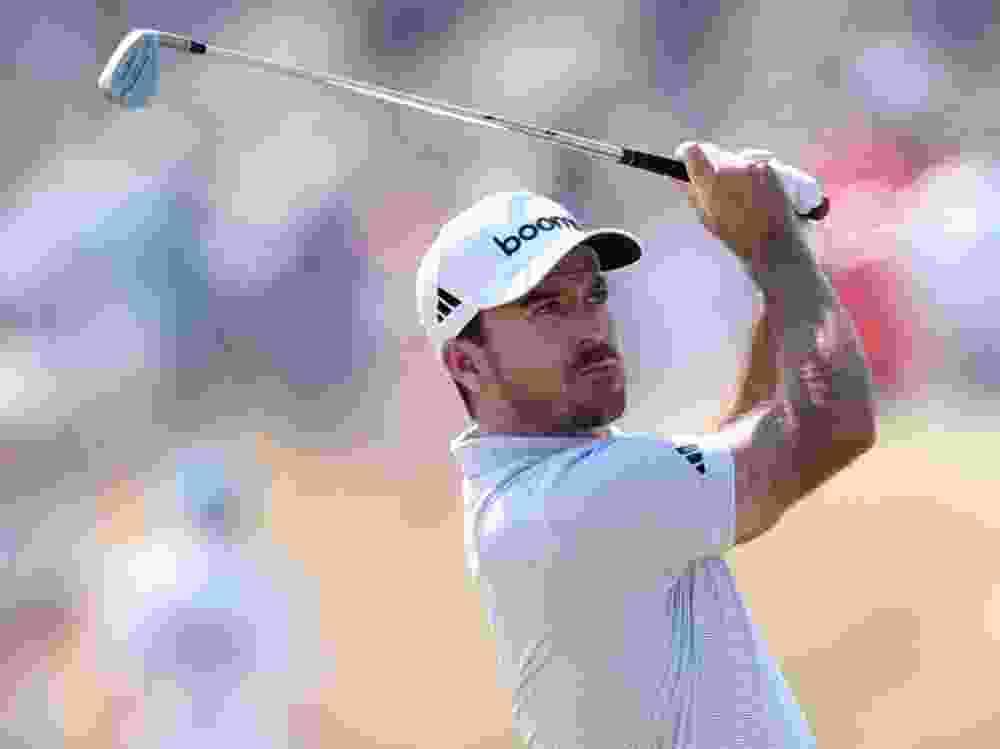 Nick Taylor of Canada plays his second shot on the 10th hole during a practice round prior to The 154th Open Championship at Royal Birkdale.
