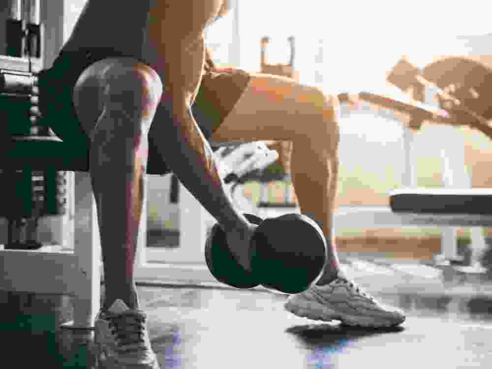 strong man exercising in the sport gym