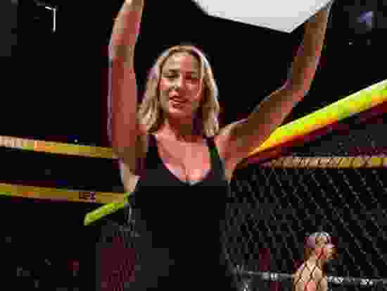 WNBA star Sophie Cunningham, ring girl at UFC 329.