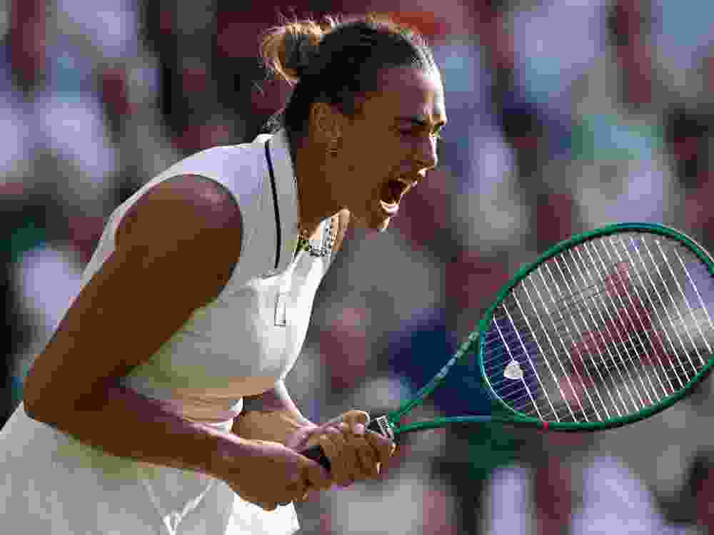 Aryna Sabalenka reacts against Naomi Osaka during their Ladies' Singles fourth round match at Wimbledon.