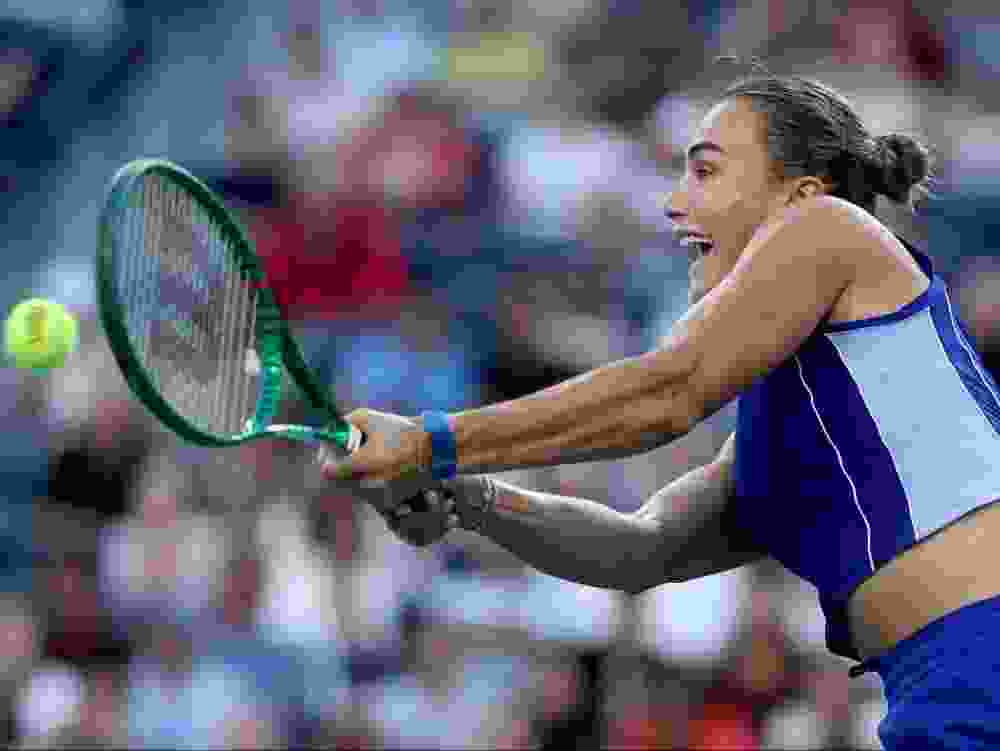 Aryna Sabalenka returns a shot to Moyuka Uchijima