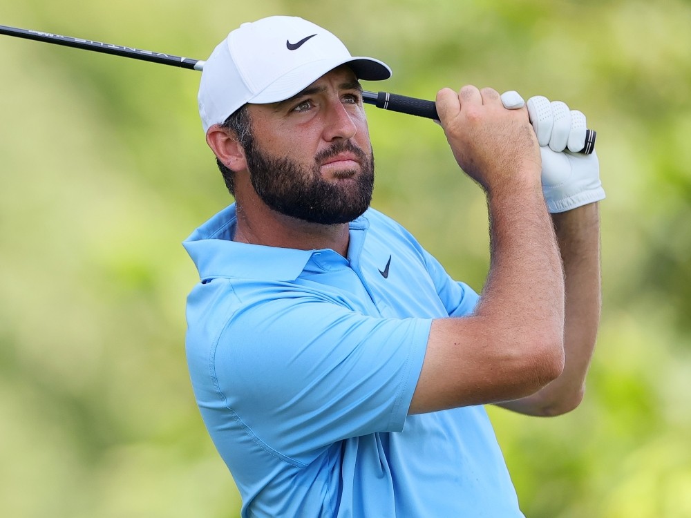 Scottie Scheffler plays his shot from the eighth tee during the final round of the BMW Championship 2026.