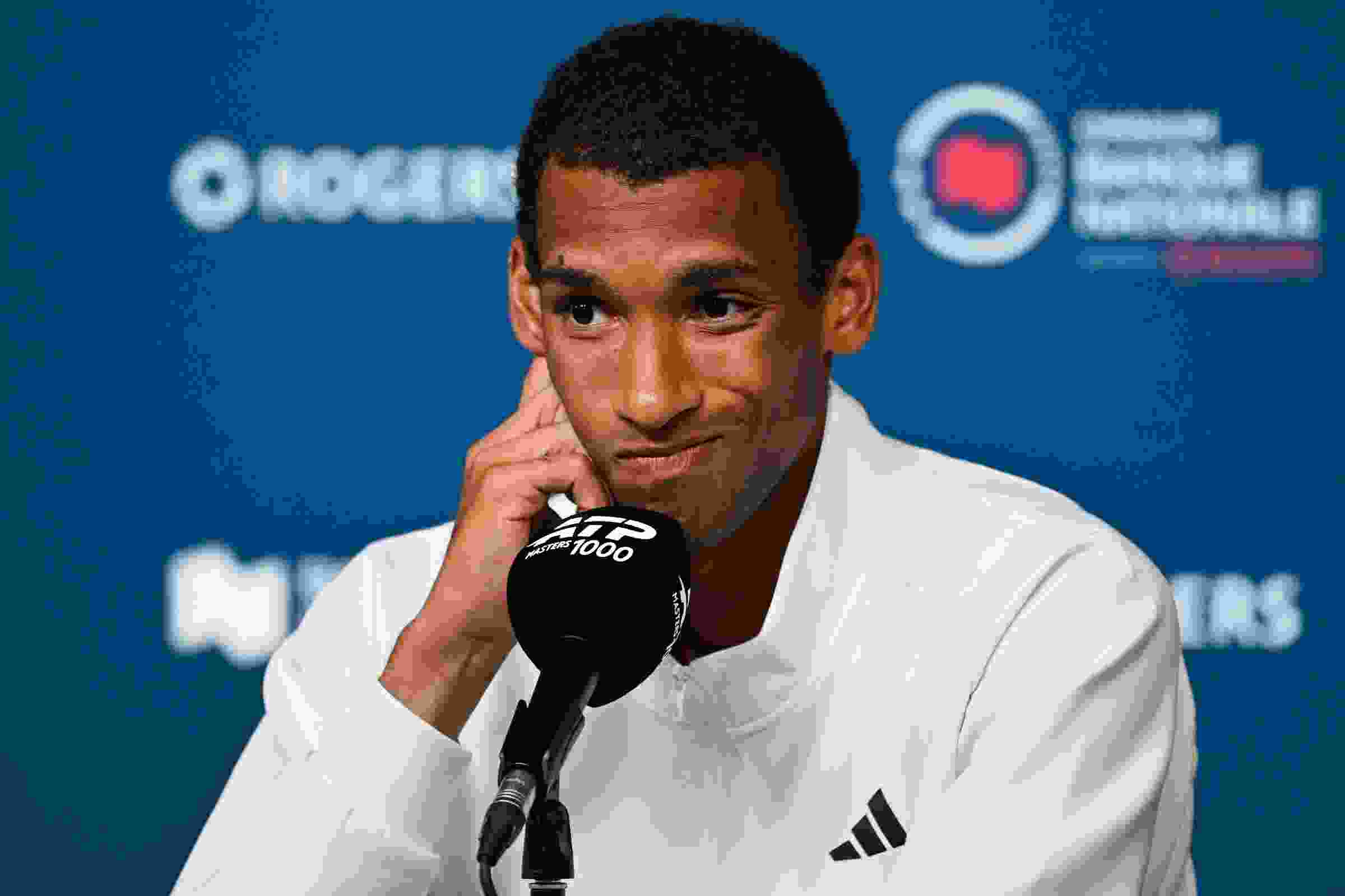 "I tried to warm up, and then I basically couldn't serve," Félix Auger-Aliassime said Wednesday of his decision to withdraw from the tournament just before his first match.