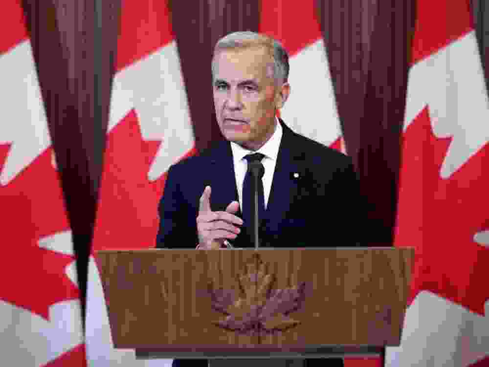 Prime Minister Mark Carney speaks at a press conference in Ottawa, on Aug.22, 2026, after trade talks with the U.S. collapsed.