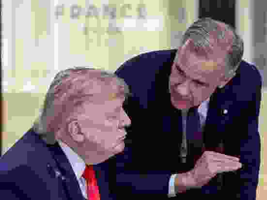 President Donald Trump speaks with Canadian Prime Minister Mark Carney at a working lunch with leaders of G7 and the Middle East on June 16 in Evian-les-Bains, France.