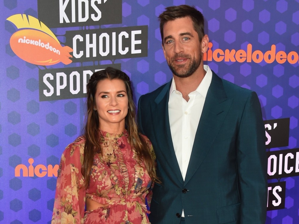 Danica Patrick (left) and Aaron Rodgers attend the Nickelodeon Kids' Choice Sports in 2018.