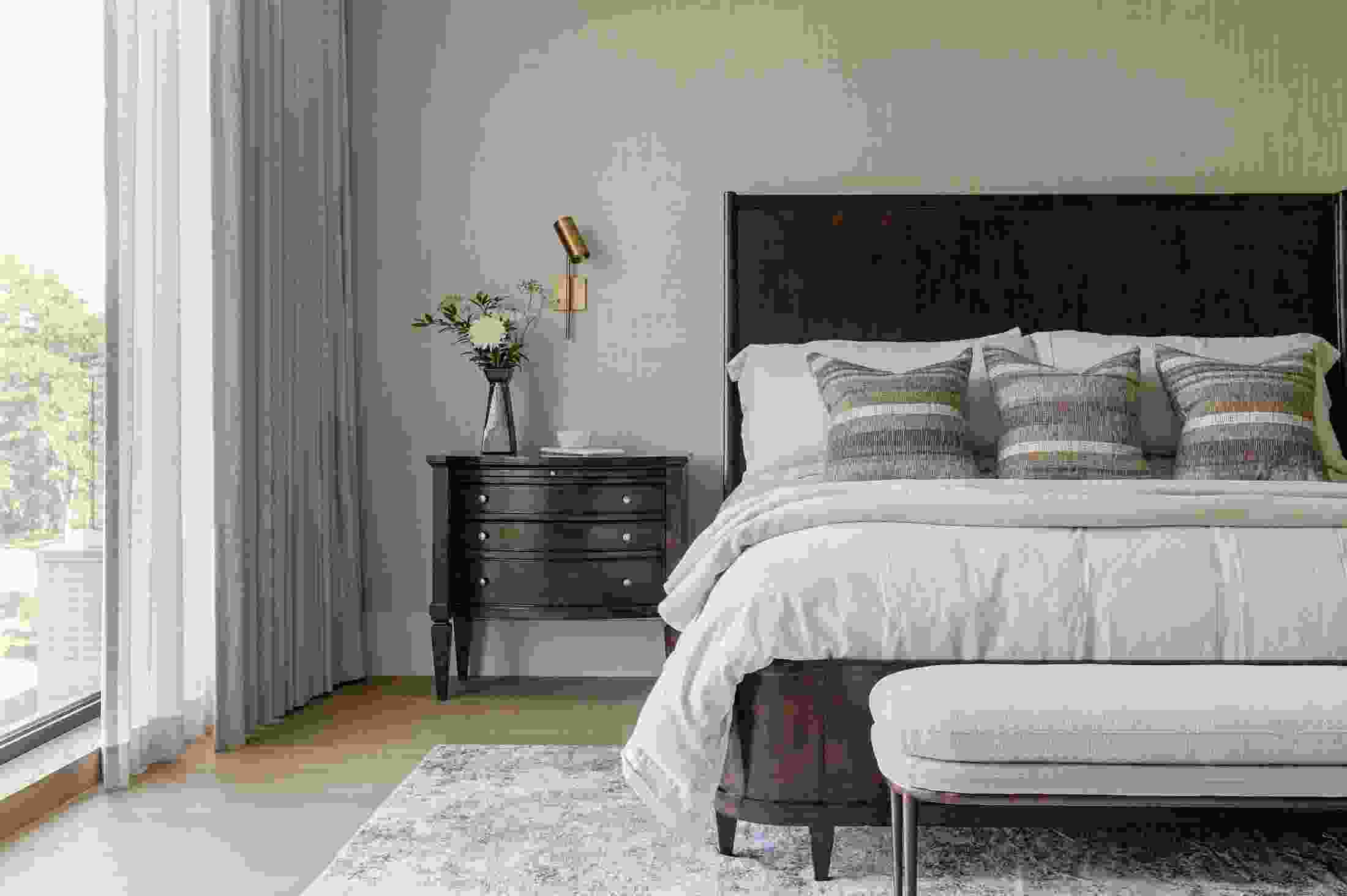 Layered bedding and tactile fabrics help create a space that feels warm and inviting, Jessica Cinnamon advices. MIKE CHAJECKI