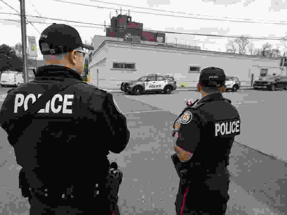 Police stand outside of Toronto’s Bobov Synagogue