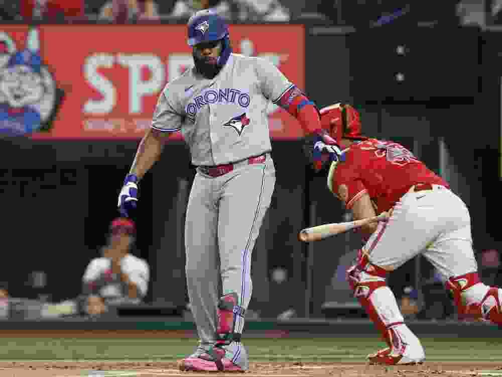 Vladimir Guerrero Jr. of the Toronto Blue Jays reacts after striking out against the Texas Rangers.