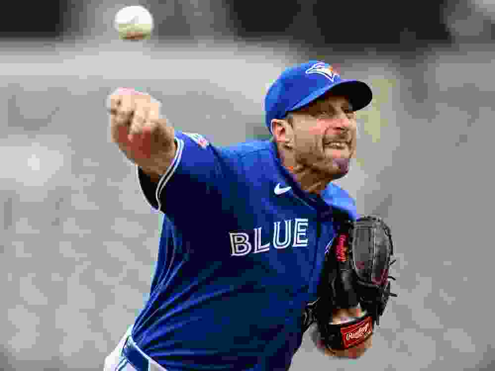 Max Scherzer of the Toronto Blue Jays pitches against the Baltimore Orioles.