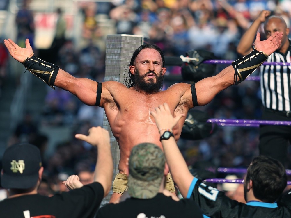 Benjamin Satterley celebrates with fans during WrestleMania 33 in 2017.