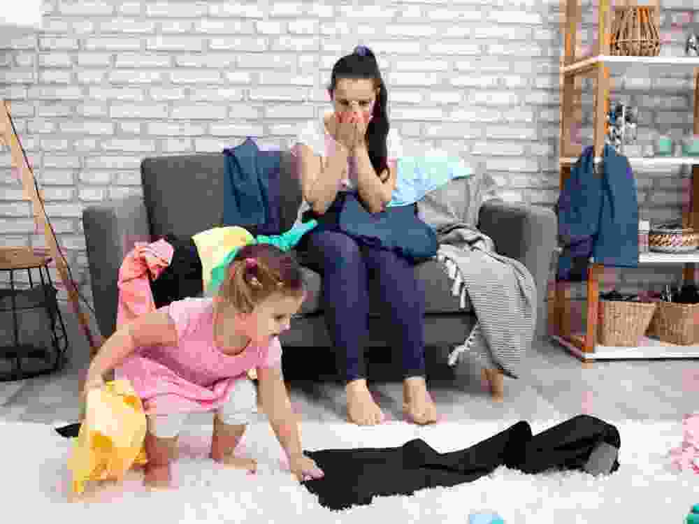 A child leaves the living room in disarray.