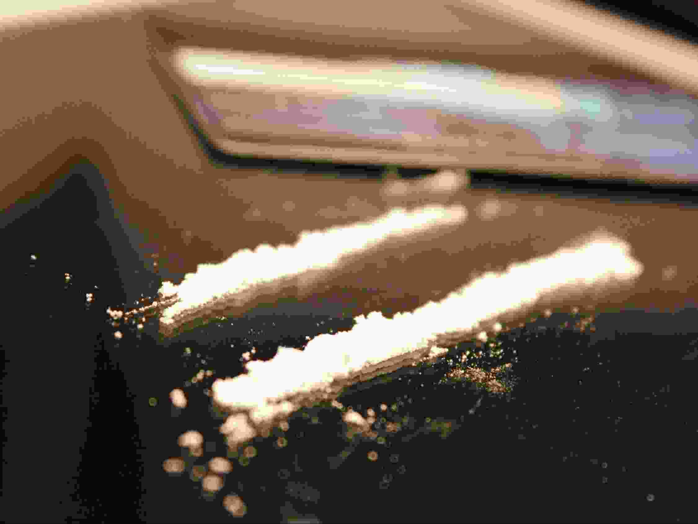 A close-up photo of cocaine lines.