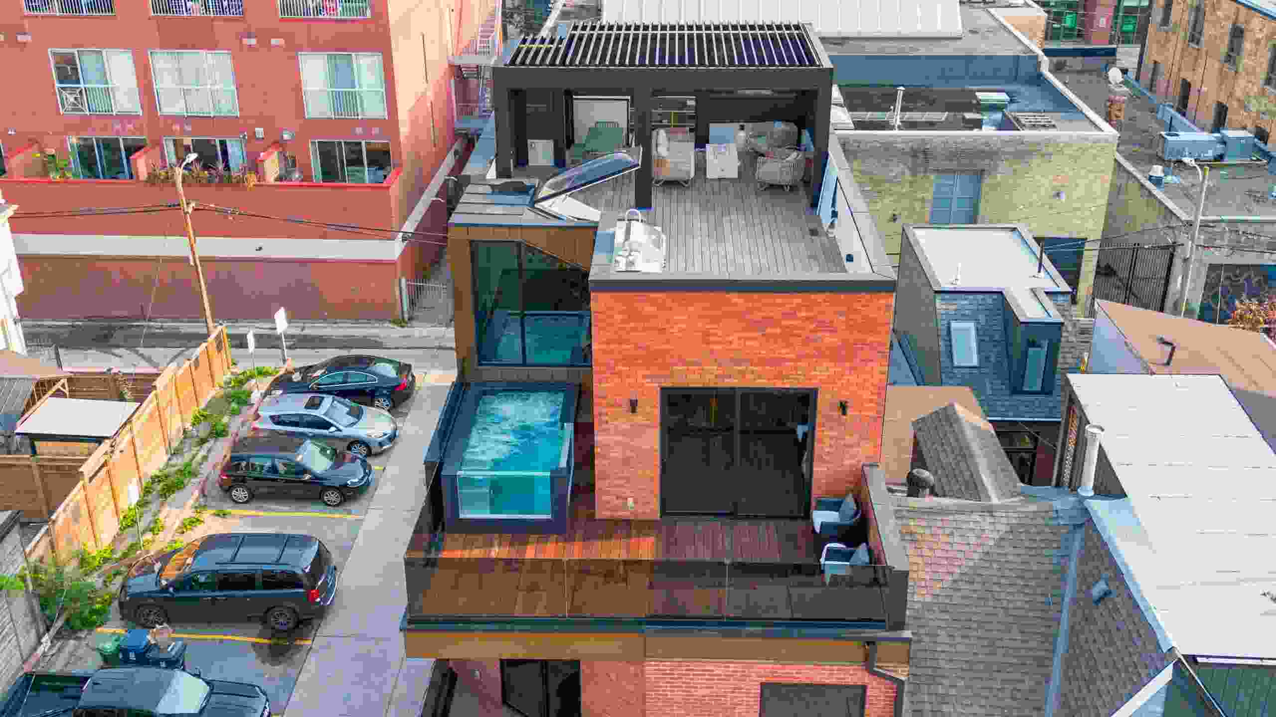 A third-floor private spa and rooftop entertainment areas are some distinctive features of this Belairbuild townhouse project. The rebuild took two years to complete.