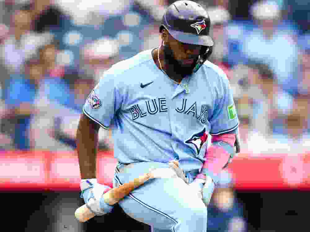 Blue Jays' Vladimir Guerrero Jr. breaks his bat after grounding out in the eighth inning of a game against the St. Louis Cardinals at Rogers Centre in Toronto, Aug. 1, 2026.