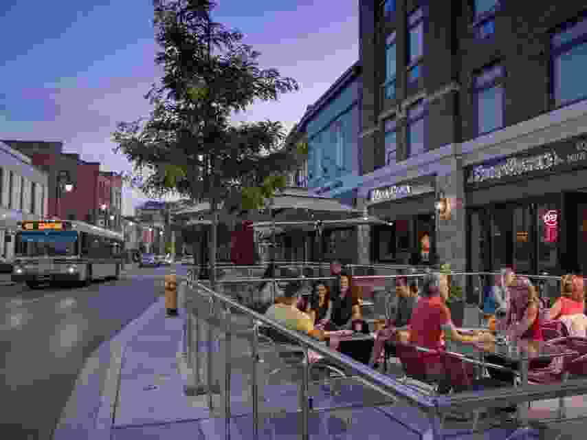 People dining on a patio in downtown St. Catharines, Ont.