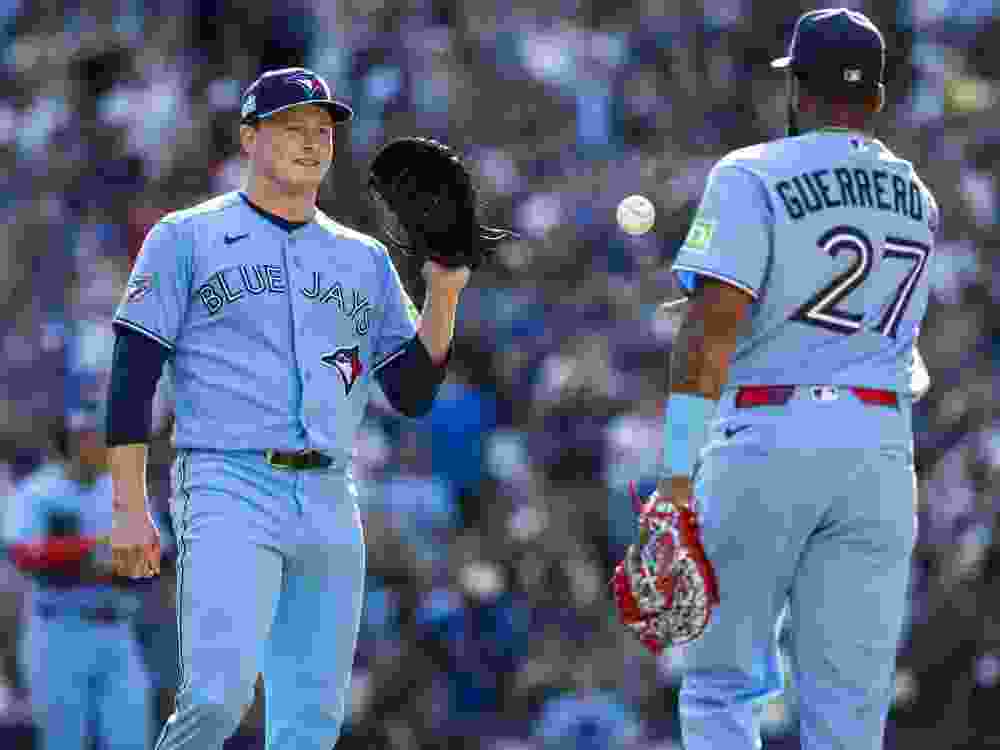 Louis Varland and Vladimir Guerrero Jr. of the Toronto Blue Jays celebrate a win over the Baltimore Orioles earlier this season.