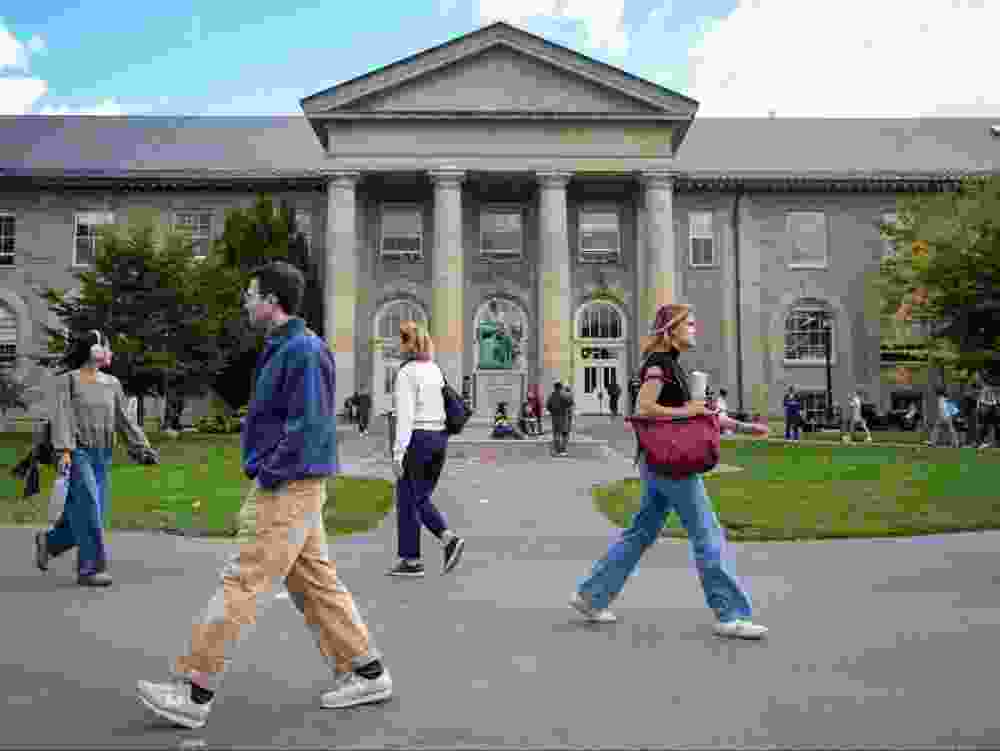 Students walk the campus grounds at Cornell University